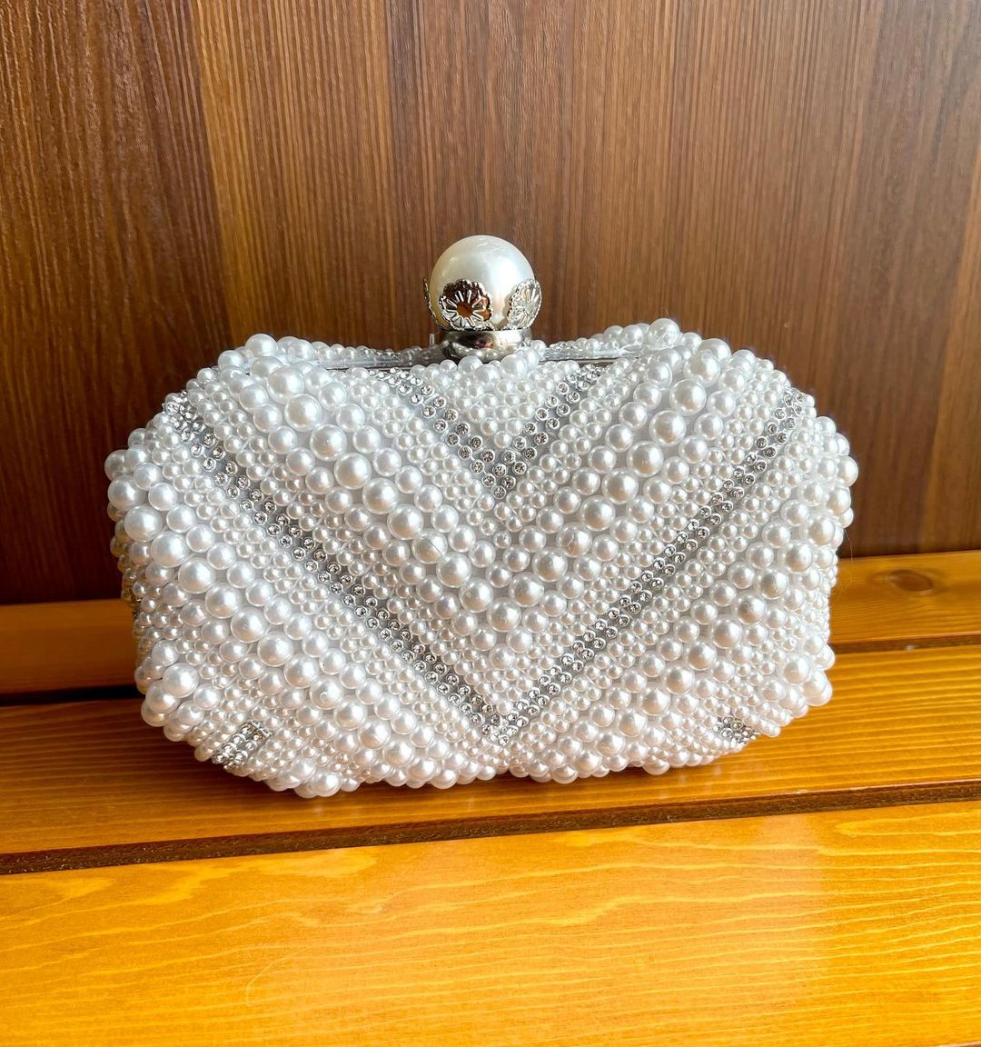 All marble covered white purse with diagonal marble and silver bead pattern